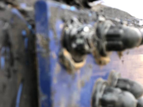 Cracked bolt caps and surface rust on bolt heads